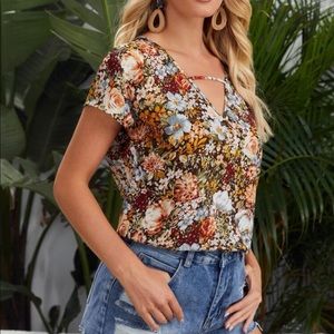 New cut out front floral print top